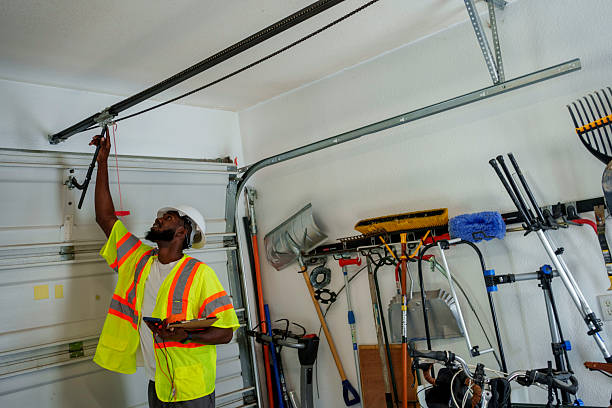 Professional Garage Door Panel Replacement technician working in North Lakes, AK